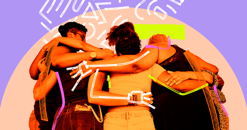 A group of Black people in a huddle.